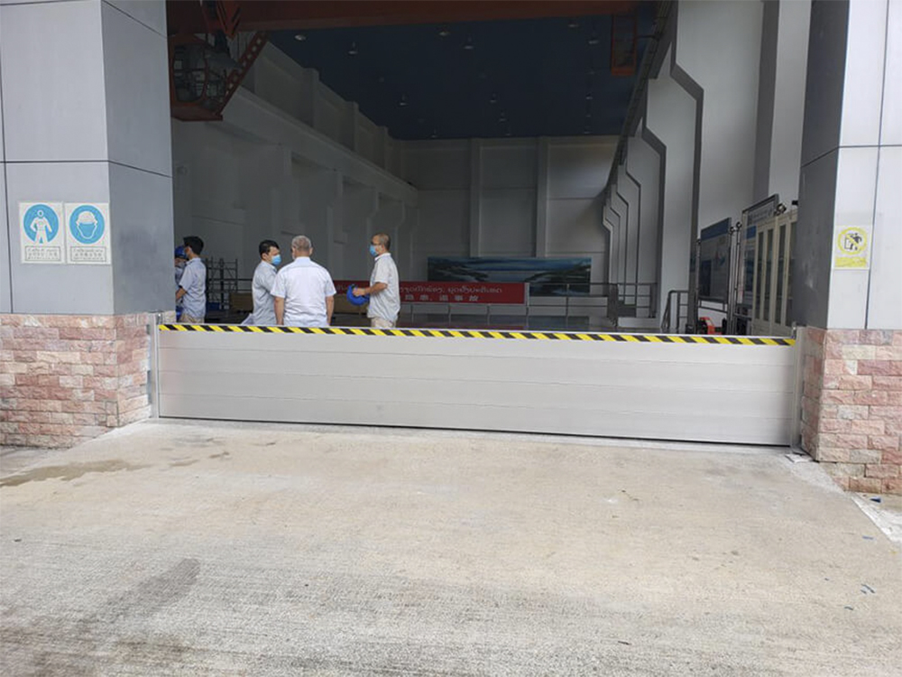 Entrance gate and main transformer room of Nanli hydropower station in Laos
